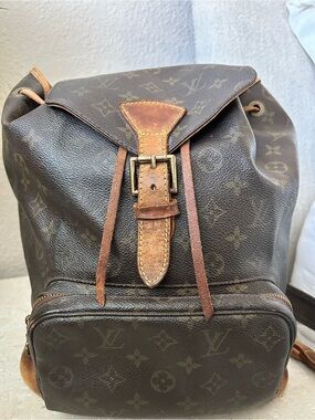 Louis Vuitton Monogram Leather Buckle Drawstring Backpack in Brown and Tan